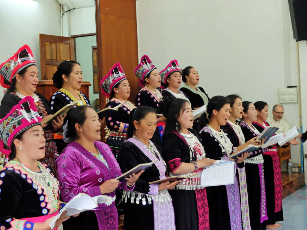 The women’s singing group of the Khun Klang church performs during a church service.