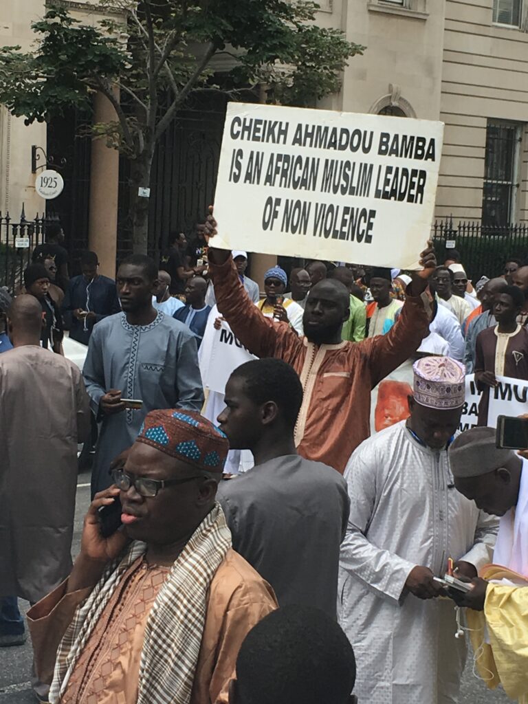 At the 2018 Bamba Day Parade in Harlem, New York City. The Muridiyya is a Senegalese Sufi Muslim order strongly committed to an old West African Muslim pacifist tradition. Photo by Jonathan Bornman.