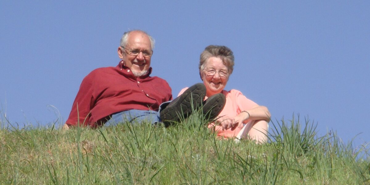 Larry and Maxine Miller sit together atop the Nanih Waiya Mound in Mississippi. Photo provided.