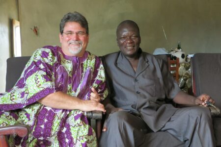 Steve Wiebe-Johnson converses with Théophane Boko in Cotonou