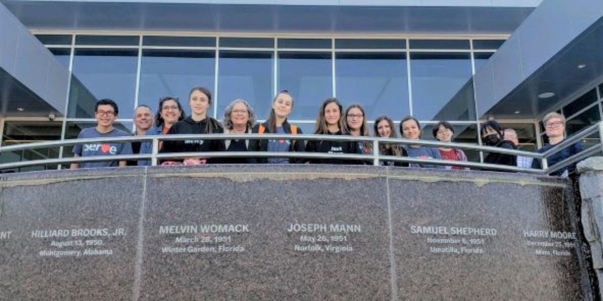 ​EMS Youth Venture E-term participants stand at the Peace and Justice Memorial Center in Montgomery