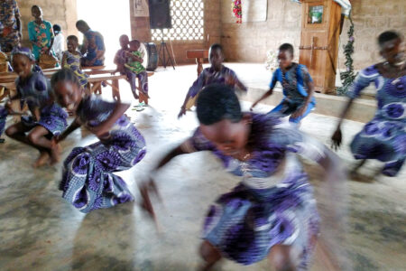 ​​Children dance during a worship service at La Casa Grande