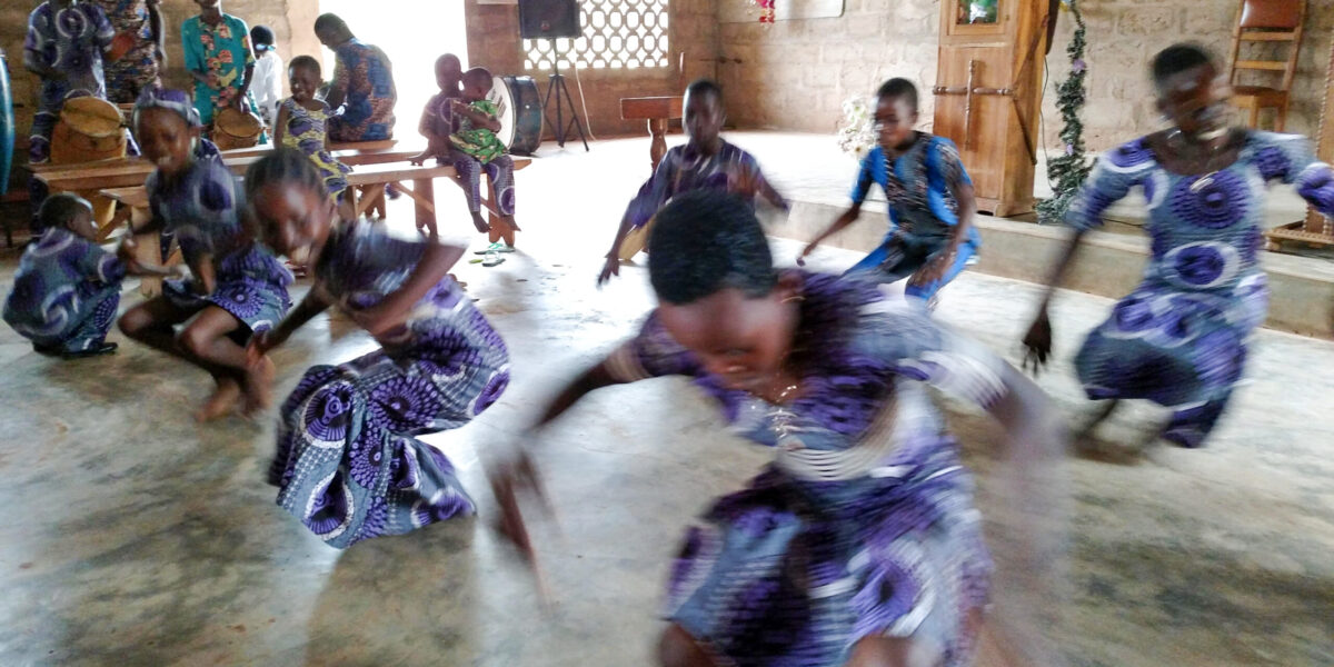 ​​Children dance during a worship service at La Casa Grande