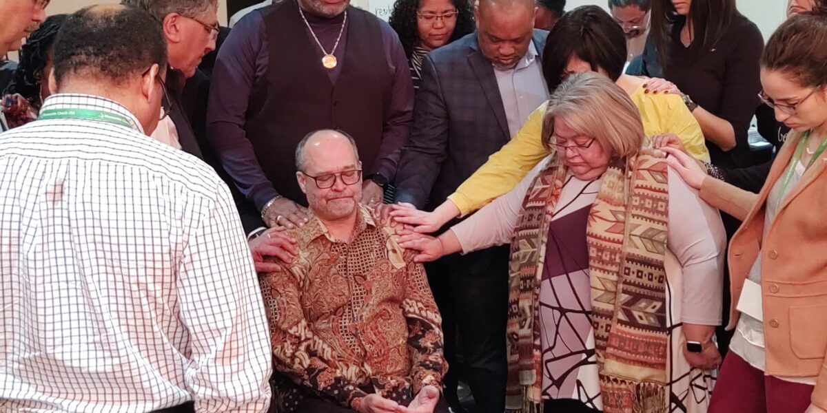 Bishop L.W. Francisco (center) of Calvary Community Church