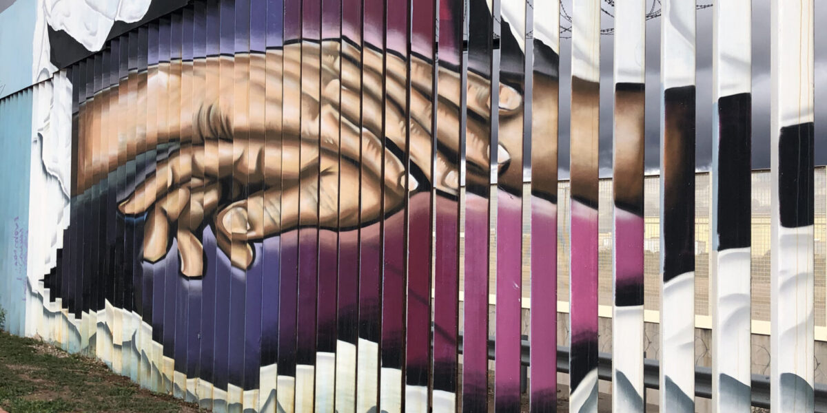 ​A mural on the Mexico side of the border wall between Agua Prieta