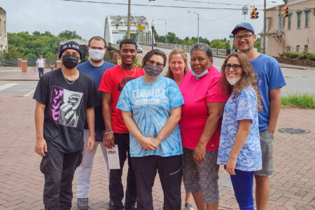 The Youth Venture Civil Rights Learning Tour team in front of the Edmund Pettus Bridge in Selma