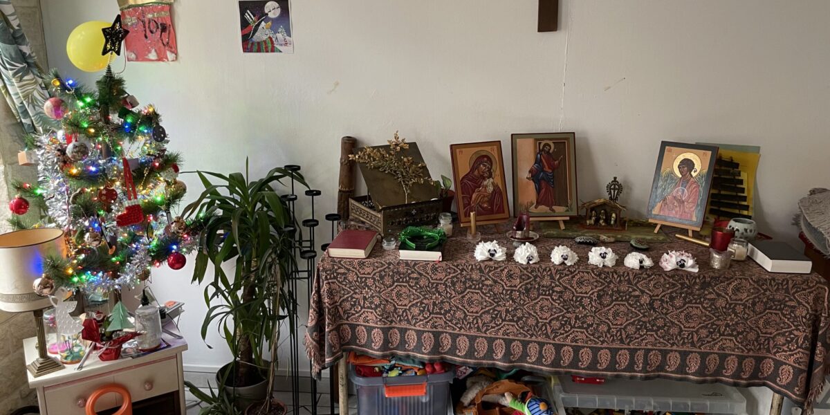 ​The residents of Maria Skobtsova House added a Christmas touch to the alter where they gather for prayer several times daily. Photographer: Joseph Givens.