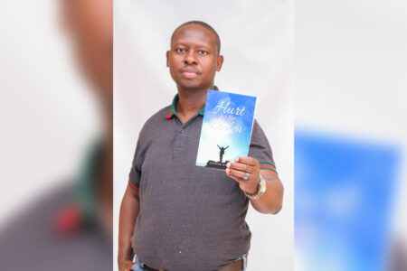 ​Lyenor Lionel Nkosi with his recently published autobiography