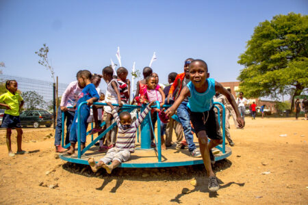 Children play at the new Bontleng Futsal Park in Botswana. Photo by Gonna Lewis. Reprinted courtesy of Imprint Botswana