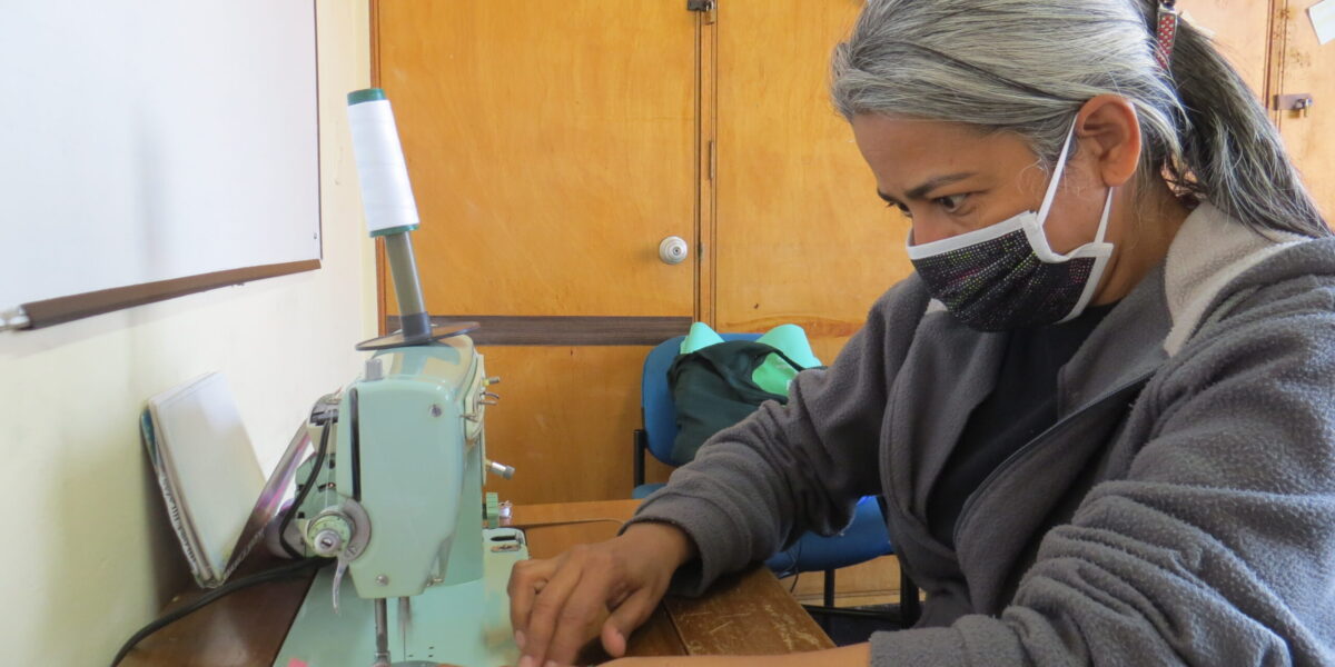 ​Yenny Rangel sews COVID-19 face masks at the Teusaquillo Mennonite Church in Bogotá