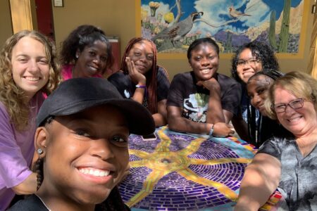 ​Participants in the Youth Venture Borderlands Learning Tour trip gather around for a selfie. For more photos of this trip