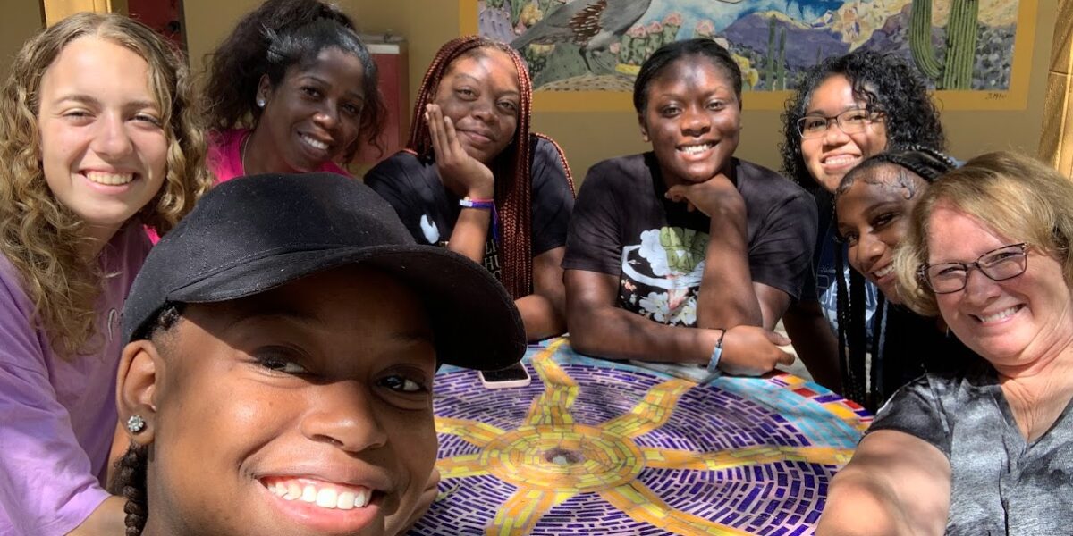 ​Participants in the Youth Venture Borderlands Learning Tour trip gather around for a selfie. For more photos of this trip