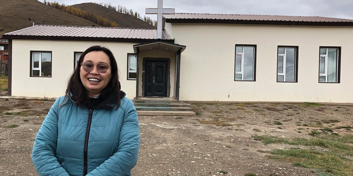 Pastor Oogii in front of the Terelj Christian Church. — Sister Care