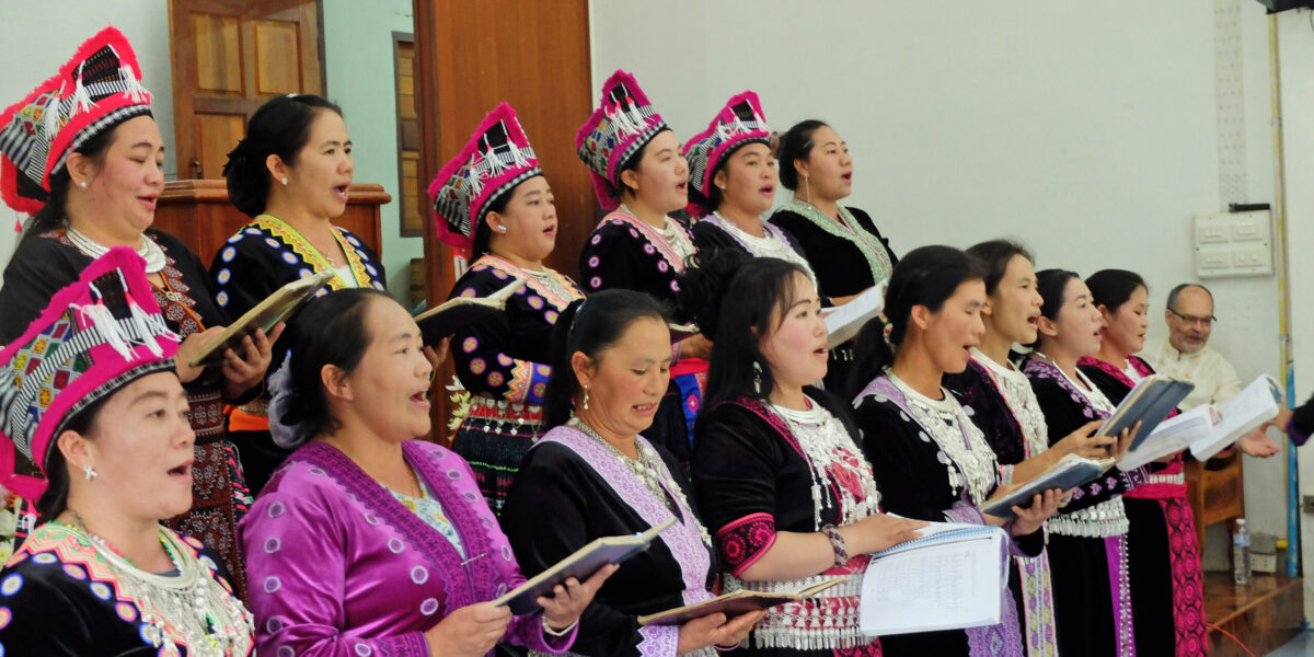 The women’s singing group of the Khun Klang church performs during a church service.