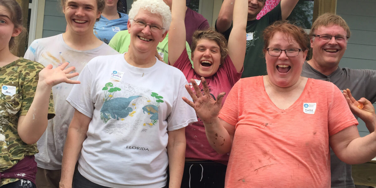 ​Service Adventure participants and leaders volunteered together working on home renovation in South Texas. From the left side of the front row to back row: Cynthia Neufeld Smith