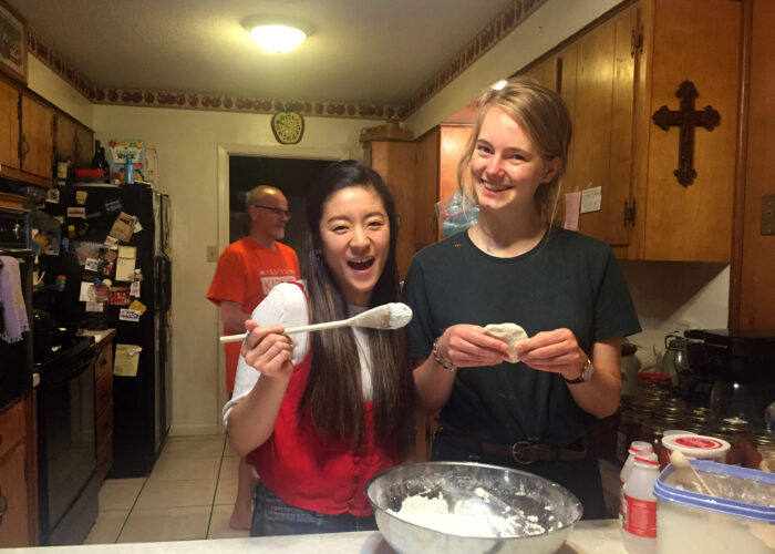 Risa Fukaya and Paula Klätte in the kitchen of their Service Adventure home in Jackson Mississippi.  Photo by Cynthia Neufeld Smith.