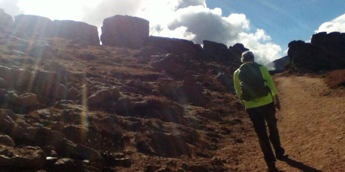 ​Service Adventure alum and support committee chairperson Joe Schrag leads a unit hike up Pike's Peak near Colorado Springs