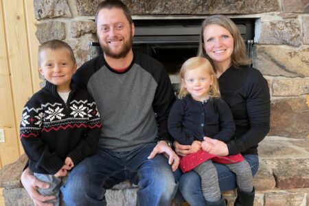 Tyler and Amanda Yoder with their two children at Rocky Mountain Mennonite Camp. Photo provided.